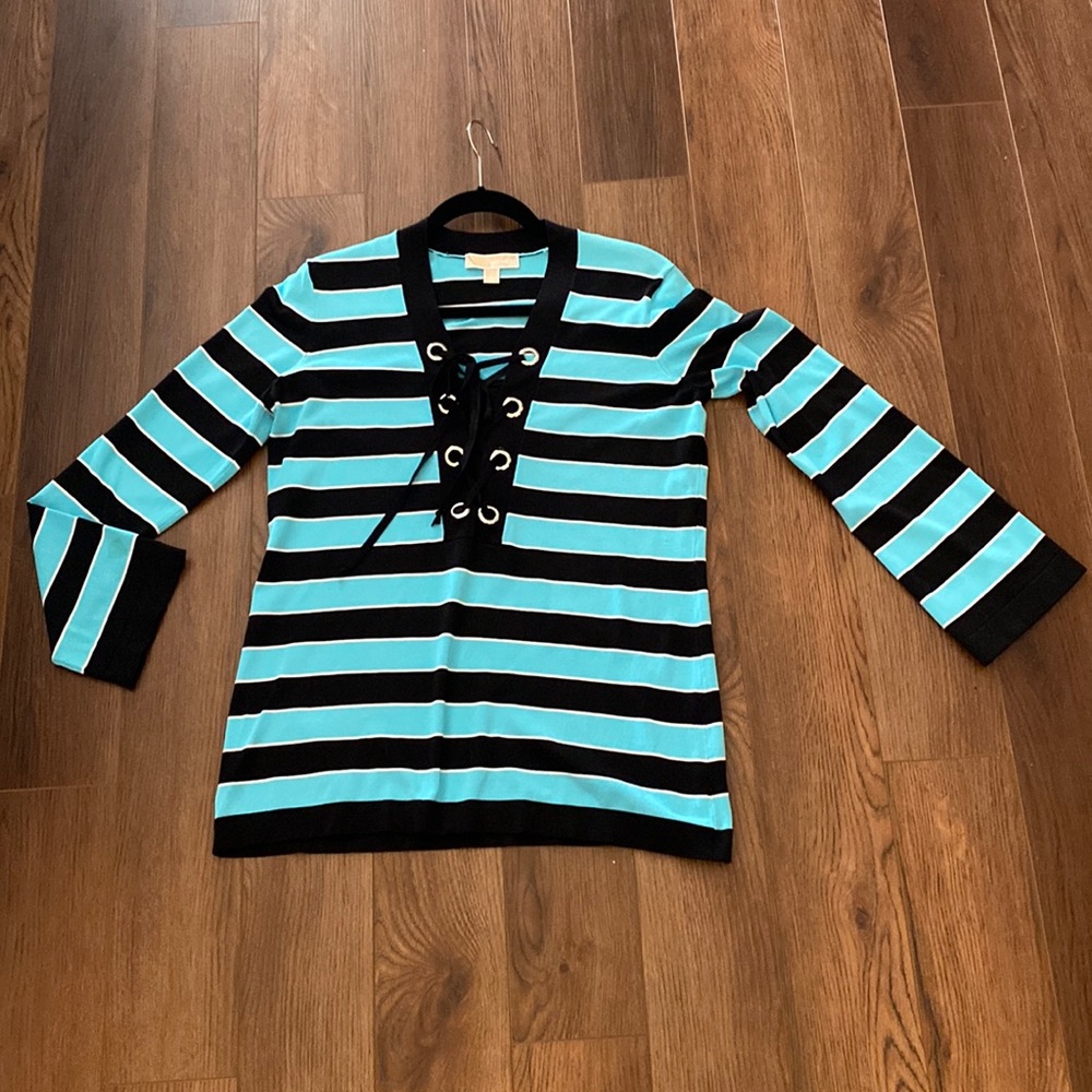 Michael Kors black and turquoise knit top; flared long sleeves.